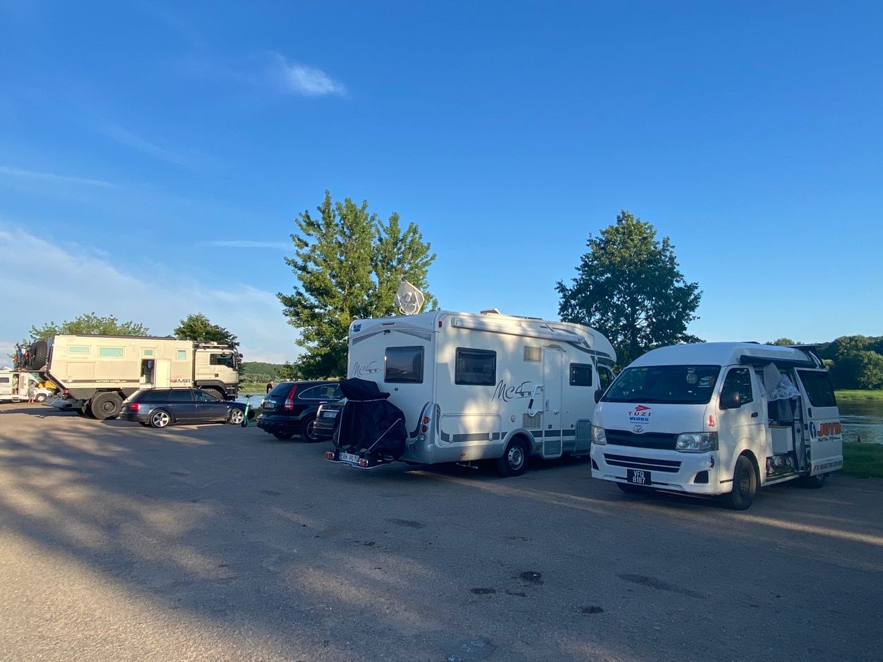 Toyotaki parked near other campervans in Kaunas, Lithuania